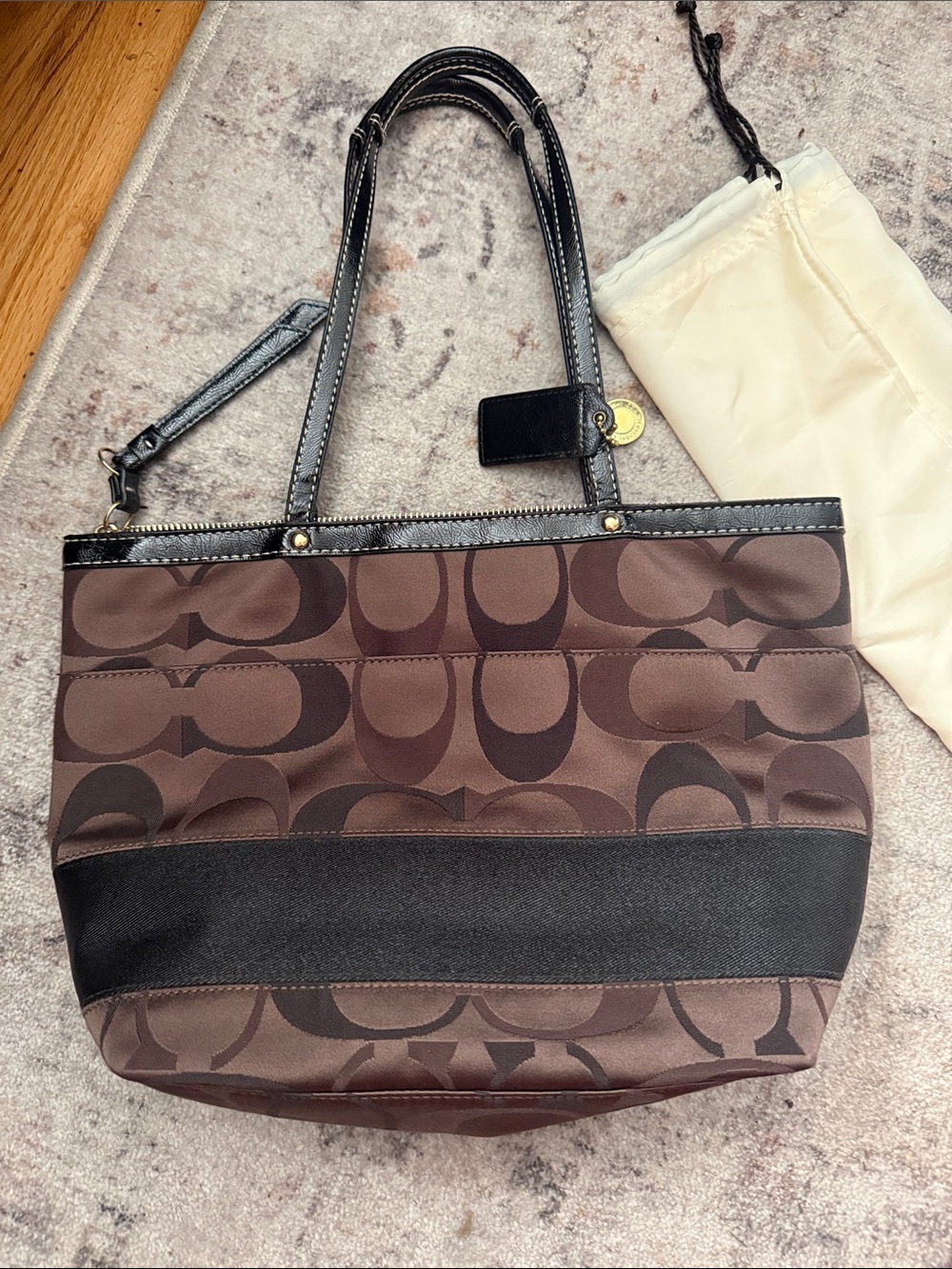 Coach Brown Signature Canvas Tote with Black Trim and Brass Accent - Picture 2 of 3